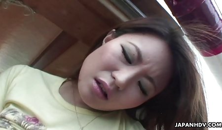 Asian lass is playing with her toy and her cunt