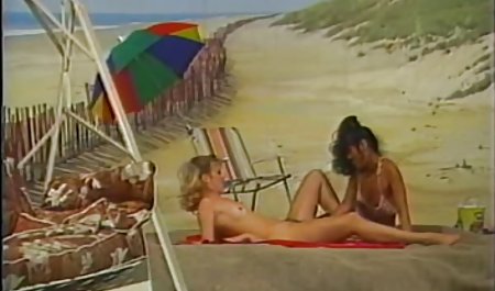 two lesbians playing at beach background