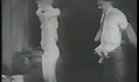 Horny chick fingers her pussy in a black and white porn